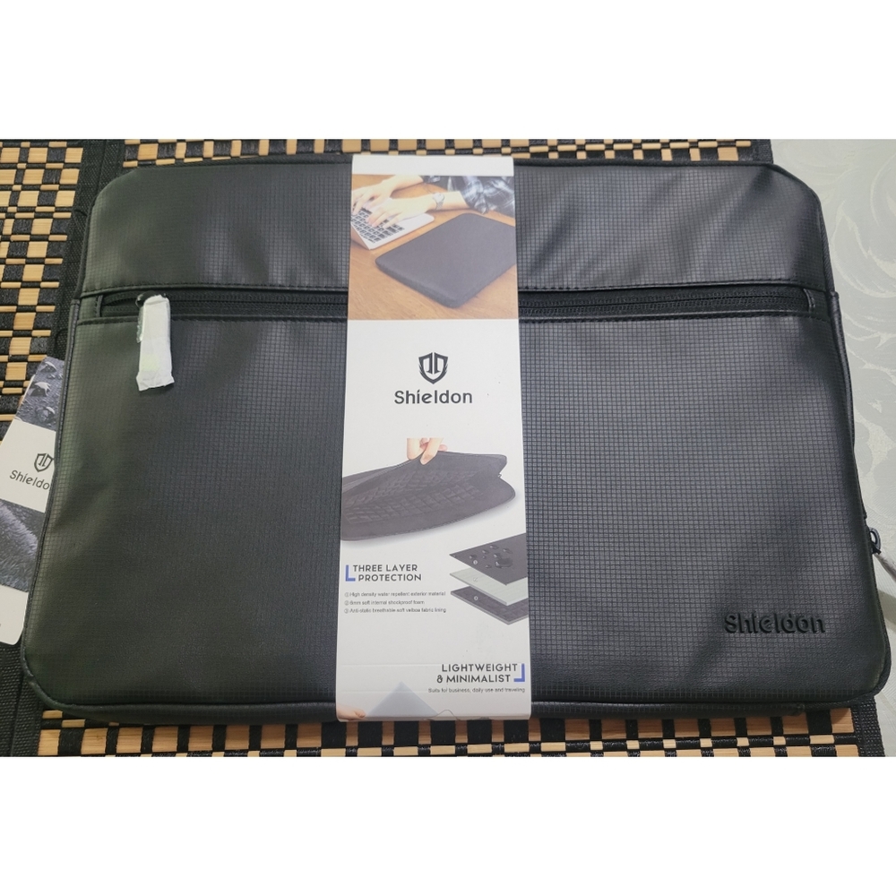 New shieldon laptop bag,black color.
